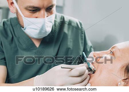 Stock Photograph - Dental check-up. Fotosearch