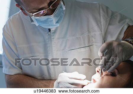 Stock Image - Dental treatment. Fotosearch