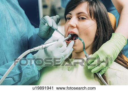 Dental treatment View Large Photo Image Stock Image - Dental treatment. Fotosearch