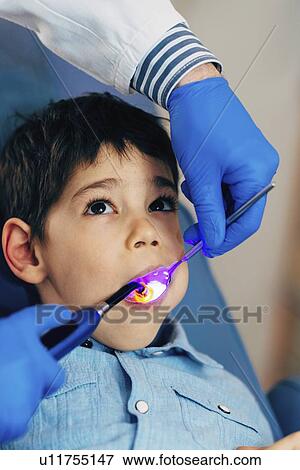 Stock Photo - Dental treatment. Fotosearch