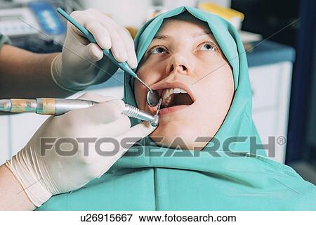 Dental treatment View Large Photo Image Stock Photo - Dental treatment. Fotosearch