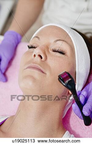 Stock Image - Dermaroller treatment. Fotosearch