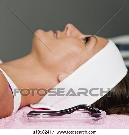 Stock Photo - Dermaroller treatment. Fotosearch