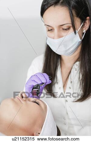 Stock Photography - Dermaroller treatment. Fotosearch