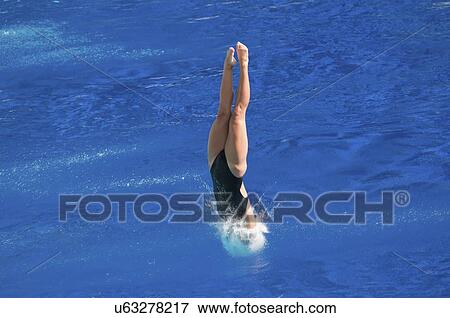Diver entering water View Large Photo Image Stock Photo - Diver entering water. Fotosearch
