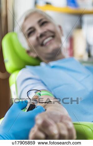 Drawing blood for platelet-rich plasma (PRP) treatment. Doctor drawing blood for a PRP cosmetics treatment. View Large Photo Image Stock Photo - Drawing blood for platelet-rich plasma (PRP) treatment. Doctor drawing blood for a PRP cosmetics treatment.. Fotosearch