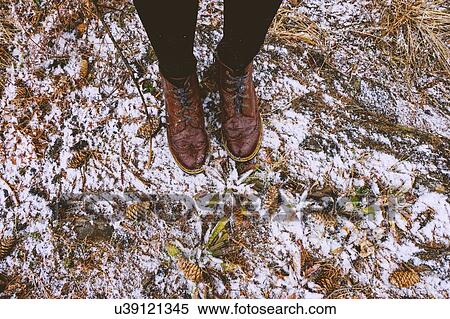 Feet of woman standing in forest in winter, Ural, Sverdlovsk, Russia View Large Photo Image Stock Photography - Feet of woman standing in forest in winter, Ural, Sverdlovsk, Russia. Fotosearch