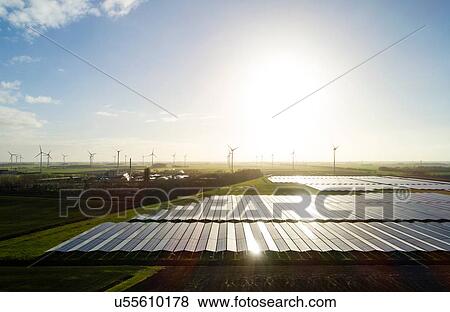 Field landscape with the largest solar farm in Netherlands, situated near Delfzijl harbour View Large Photo Image Stock Photo - Field landscape with the largest solar farm in Netherlands, situated near Delfzijl harbour. Fotosearch