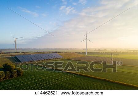 Field landscape with wind turbines and solar farm located on former waste dump, elevated view, Netherlands View Large Photo Image Stock Image - Field landscape with wind turbines and solar farm located on former waste dump, elevated view, Netherlands. Fotosearch