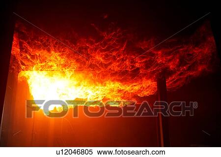Stock Photography - Fire raging inside building. Fotosearch