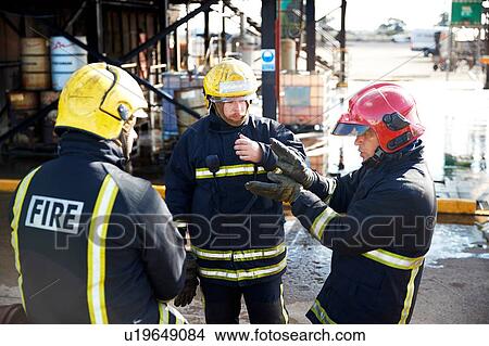 Firemen in discussion in training centre, Darlington, UK View Large Photo Image Picture - Firemen in discussion in training centre, Darlington, UK. Fotosearch