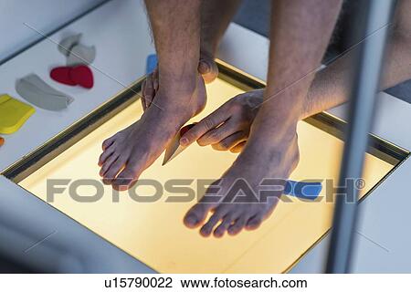 Stock Image - Foot pressure scan. Fotosearch
