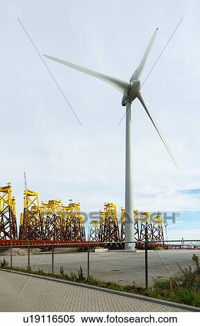 Foundations for offshore wind turbines stored Vlissingen harbour; these platforms are called jacket. waiting to be shipped to new north sea Borssele wind farm, Netherlands View Large Photo Image Stock Photography - Foundations for offshore wind turbines stored Vlissingen harbour; these platforms are called jacket. waiting to be shipped to new north sea Borssele wind farm, Netherlands. Fotosearch