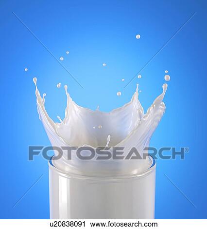 Glass full of milk with crown splash. Close up view, on blue background. View Large Photo Image Stock Image - Glass full of milk with crown splash. Close up view, on blue background.. Fotosearch