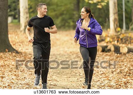 Happy couple jogging View Large Photo Image Stock Image - Happy couple jogging. Fotosearch