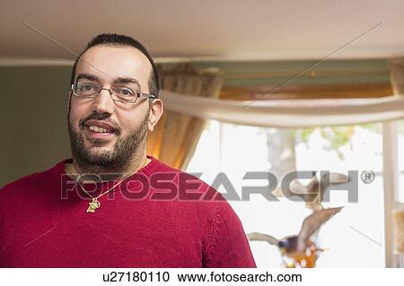 Happy man with visual impairment at home View Large Photo Image Stock Image - Happy man with visual impairment at home. Fotosearch