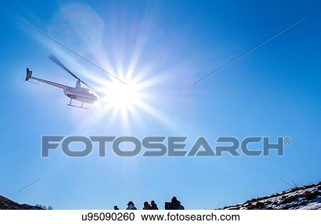 Stock Image - Helicopter flying over Piani Resinelli, Lombardy, Italy. Fotosearch