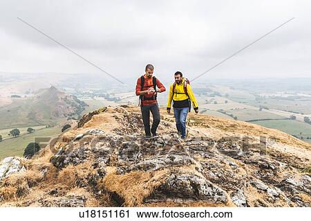 Hiker checking time, Chrome Hill, Peak District, Derbyshire View Large Photo Image Stock Image - Hiker checking time, Chrome Hill, Peak District, Derbyshire. Fotosearch