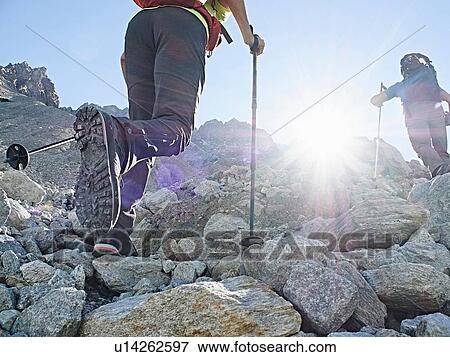 Stock Photo - Hiker friends in Mont Cervin, Matterhorn, Valais, Switzerland. Fotosearch