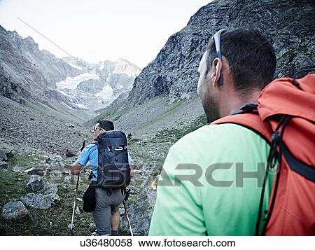 Stock Photo - Hiker friends in Mont Cervin, Matterhorn, Valais, Switzerland. Fotosearch