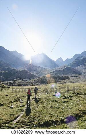 Stock Photo - Hiker friends in Mont Cervin, Matterhorn, Valais, Switzerland. Fotosearch