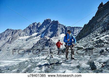 Hiker friends in Mont Cervin, Matterhorn, Valais, Switzerland View Large Photo Image Stock Photography - Hiker friends in Mont Cervin, Matterhorn, Valais, Switzerland. Fotosearch