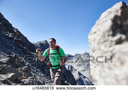 Hiker in Mont Cervin, Matterhorn, Valais, Switzerland View Large Photo Image Stock Photo - Hiker in Mont Cervin, Matterhorn, Valais, Switzerland. Fotosearch