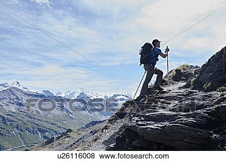 Hiker in Mont Cervin, Matterhorn, Valais, Switzerland View Large Photo Image Stock Photo - Hiker in Mont Cervin, Matterhorn, Valais, Switzerland. Fotosearch