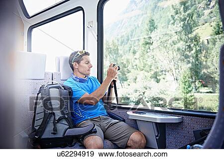 Stock Photo - Hiker in train, Valais, Switzerland. Fotosearch