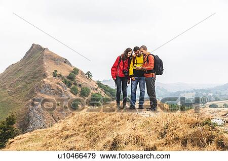 Hikers map reading, Chrome Hill, Peak District, Derbyshire View Large Photo Image Stock Photo - Hikers map reading, Chrome Hill, Peak District, Derbyshire. Fotosearch