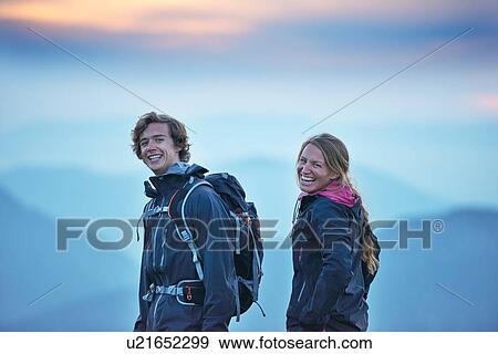 Stock Photo - Hikers on misty day, Manigod, Rhone-Alpes, France. Fotosearch