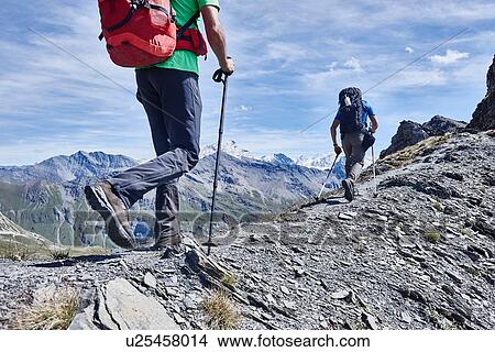 Picture - Hikers on ridge, Mont Cervin, Matterhorn, Valais, Switzerland. Fotosearch
