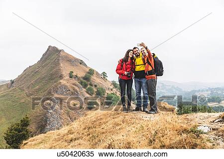 Hikers taking selfie, Chrome Hill, Peak District, Derbyshire View Large Photo Image Stock Photography - Hikers taking selfie, Chrome Hill, Peak District, Derbyshire. Fotosearch