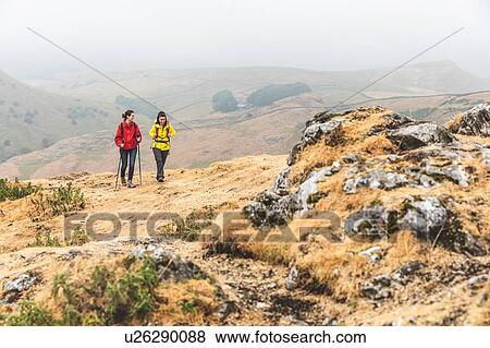 Hikers using walking poles, Chrome Hill, Peak District, Derbyshire View Large Photo Image Stock Photo - Hikers using walking poles, Chrome Hill, Peak District, Derbyshire. Fotosearch