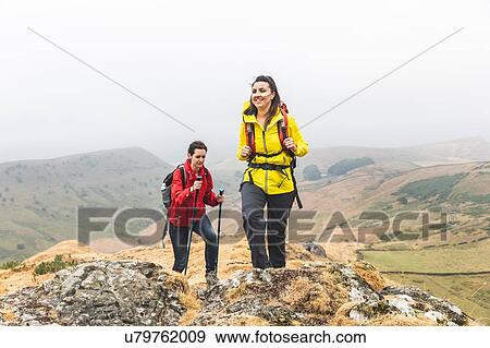 Hikers using walking poles, Chrome Hill, Peak District, Derbyshire View Large Photo Image Stock Photo - Hikers using walking poles, Chrome Hill, Peak District, Derbyshire. Fotosearch