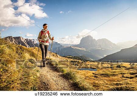 Hiking in Puez-Geisler, around Geislergruppe, Dolomites, Trentino-Alto Adige, Italy View Large Photo Image Stock Photograph - Hiking in Puez-Geisler, around Geislergruppe, Dolomites, Trentino-Alto Adige, Italy. Fotosearch