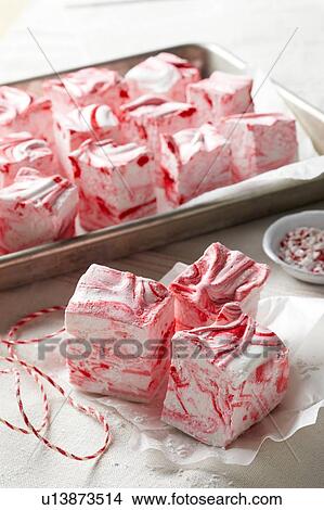 Homemade peppermint marshmallows with twine and wax paper View Large Photo Image Picture - Homemade peppermint marshmallows with twine and wax paper. Fotosearch