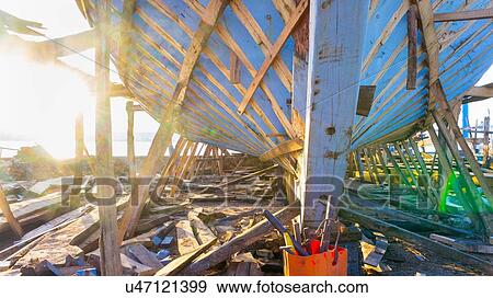 Stock Photo - Hull of boat docked for maintenance, Essaouira, Morocco. Fotosearch