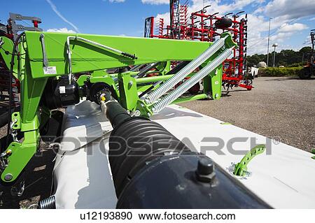 Stock Image - Hydraukic systems on an industrial mower coupled to a tractor.. Fotosearch