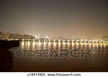 Stock Photography - Illumination of Banpo Bridge reflected in water, Han River, Seoul, South Korea. Fotosearch