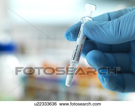 Influenza vaccine View Large Photo Image Stock Photograph - Influenza vaccine. Fotosearch