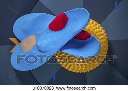 Stock Image - Insoles and balance pad. Fotosearch
