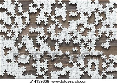Stock Photo - Jigsaw puzzle pieces and gaps, illustration. Fotosearch