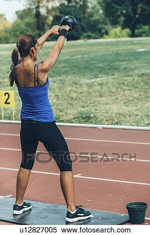 Kettlebell swing competition View Large Photo Image Stock Photography - Kettlebell swing competition. Fotosearch
