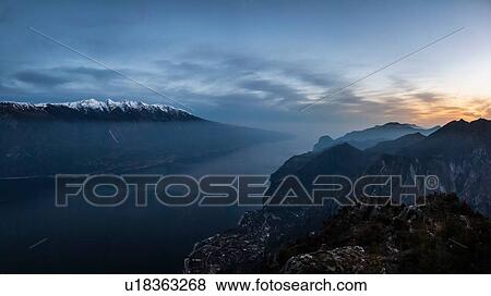 Lake Garda with Limone sul Garda down by the lake; view south, high angle view, Lombardia, Italy View Large Photo Image Stock Photo - Lake Garda with Limone sul Garda down by the lake; view south, high angle view, Lombardia, Italy. Fotosearch