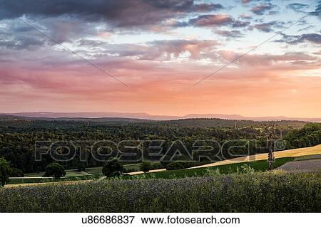 Stock Photo - Landscape over fields and forests, elevated view, Nussbaum, Germany. Fotosearch