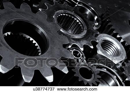 Large titanium gears and cogs mainly used in the aerospace industry and rockets. View Large Photo Image Stock Photo - Large titanium gears and cogs mainly used in the aerospace industry and rockets.. Fotosearch