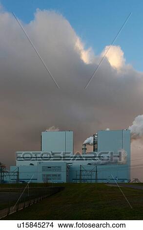 Picture - Largest coal burning power plant in Netherlands near Eemshaven harbour. Fotosearch