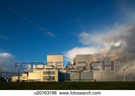 Largest coal burning power plant in Netherlands near Eemshaven harbour View Large Photo Image Stock Photograph - Largest coal burning power plant in Netherlands near Eemshaven harbour. Fotosearch