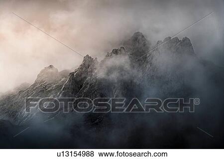 Low cloud over mountains, detail, near Fuente De in national reserve Parque National de los Picos de Europa, Potes, Cantabria, Spain View Large Photo Image Stock Photo - Low cloud over mountains, detail, near Fuente De in national reserve Parque National de los Picos de Europa, Potes, Cantabria, Spain. Fotosearch